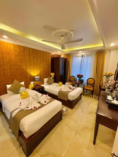 Habitación Deluxe con 2 camas — Nam Cường X Hotel